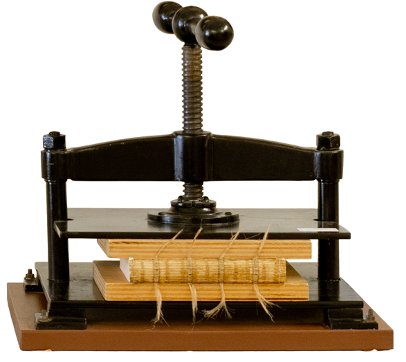 Fein säuberlich werden die Buchseiten gestapelt und aufgefädelt.