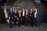 Durchschlagsfeier in Mürzzuschlag: LH-Stv. Udo Landbauer, KO Jochen Danninger, BM Leonore Gewessler, ÖBB-Chef Andreas Matthä, EU-Kommissar Johannes Hahn, LH Christopher Drexler und LH-Stv. Anton Lang.